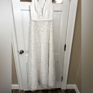 Brand new wedding dress with tags.